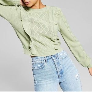 AND NOW THIS CABLE KNIT SWEATER